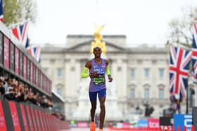 Sir Mo Farah crosses the line at the London Marathon; he will be at Manchester 10K soon. Photo: Getty Images