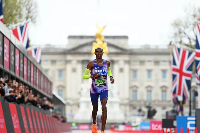 Sir Mo Farah crosses the line at the London Marathon. Photo: Getty Images