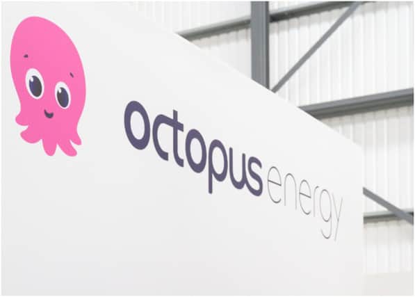 Heat pump plumbing engineers install a Daikin 9kw heat pump at the Octopus Energy training facility on November 02, 2021 in Slough, England. Ahead of COP26, the UK government announced plans to offer grants to help households install air-source heat pumps over the next three years, encouraging them to ditch their gas and oil-fired boilers. (Photo by Leon Neal/Getty Images)