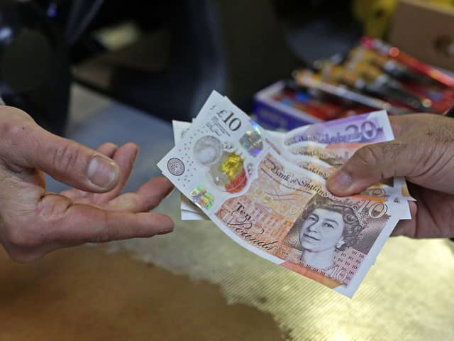 The first instalment of the £900 cost of living payments is set to land in bank accounts today. The £301 cash boost from the Department for Work and Pensions (DWP) and HMRC will be paid to those who are eligible over the next few weeks from Tuesday, April 25.