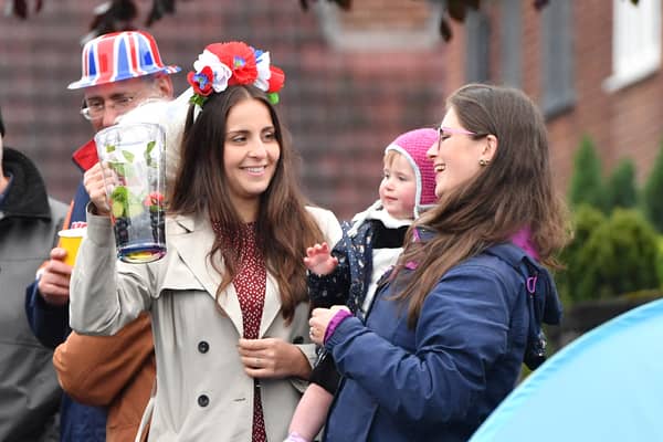 People in Manchester celebrating a previous royal occasion, here in Denton Credit: Getty