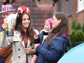 People in Manchester celebrating a previous royal occasion, here in Denton Credit: Getty