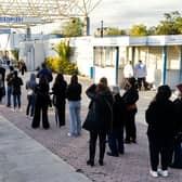 Cypriots wait in line to receive the third dose of a Covid-19 vaccine at a walk-in vaccination centre (Photo: Getty Images)