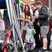 Folk in Denton enjoying a previous royal street party in 2022 Credit: Getty