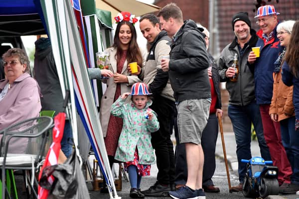 Folk in Denton enjoying a previous royal street party in 2022 Credit: Getty