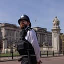 A Met Police officer outside Buckingham Palace, ahead of the Coronation. (Photo by Dan Kitwood/Getty Images)