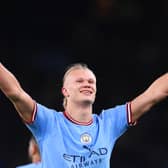 Erling Haaland celebrates scoring a goal for Manchester City
