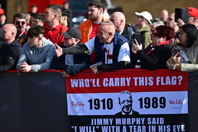 Manchester United fans at the statue unveiling at Old Trafford. Photo: Manchester United via Getty Images