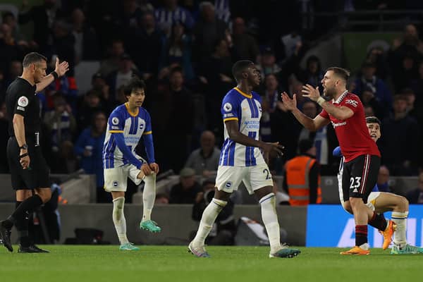 Luke Shaw was furious with Andre Marriner’s injury-time decision as Manchester United lost to Brighton.