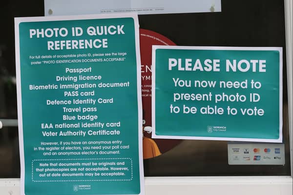 A sign at the local election reminding voters they need to bring ID. Photo: Getty Images