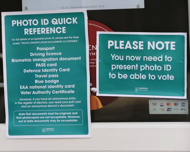 A sign at the local election reminding voters they need to bring ID. Photo: Getty Images
