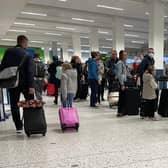 Passengers queuing at Manchester Airport in April 2022. Photo: Getty Images