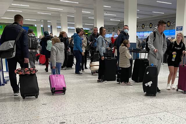 Passengers queuing at Manchester Airport in April 2022. Photo: Getty Images