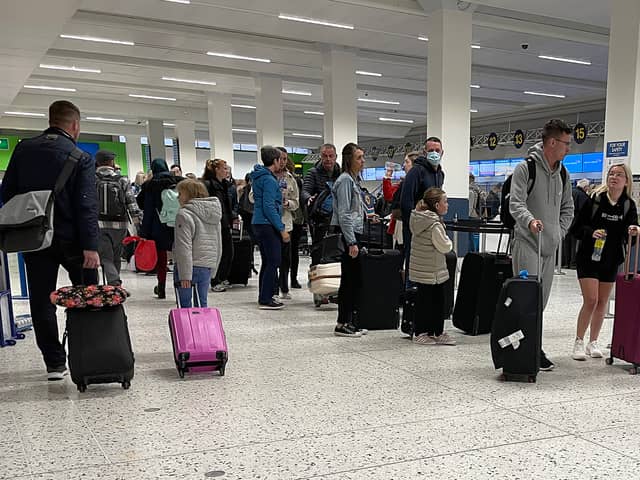 Passengers queuing at Manchester Airport in April 2022. Photo: Getty Images