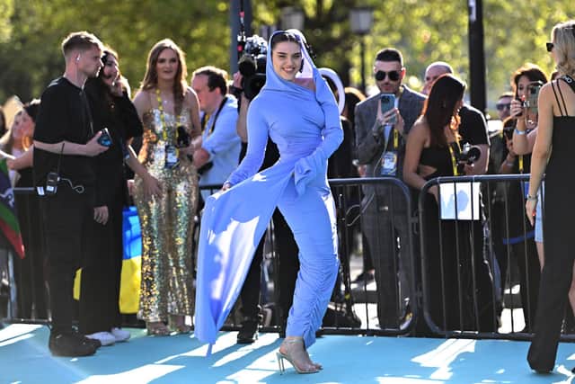 UK representative Mae Muller poses for photographers at the Eurovision 2023 opening ceremony. (Photo by Anthony Devlin/Getty Images)