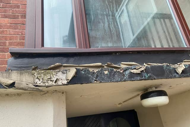 Evidence of flaking paint on a canopy on the Canterbury Gardens estate