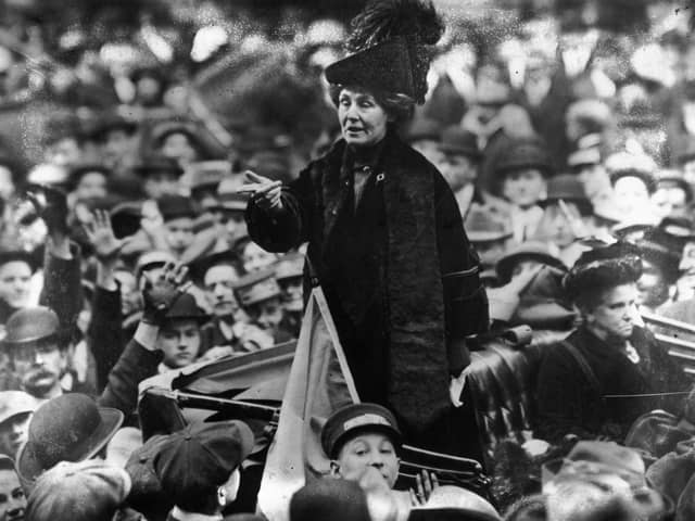 British suffragette Emmeline Pankhurst (1858 - 1928), being jeered by a crowd in New York.  (Photo by Topical Press Agency/Getty Images)