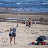 The Met Office has released weather forecasts for the UK, with temperatures likely to hit 21°C. (Photo by Jeff J Mitchell/Getty Images)