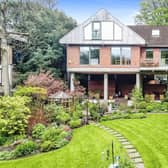 The property has a stunning garden and is raised on stilts for even more spectacular view
