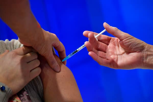 Three-quarters of adults in the UK have received both doses of a Covid-19 vaccine (Photo by JUSTIN TALLIS/AFP via Getty Images)