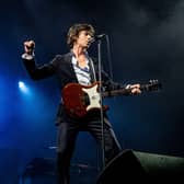 Alex Turner (L) of the Arctic Monkeys performs during a concert in the Ziggo Dome, Amsterdam, on May 5, 2023.