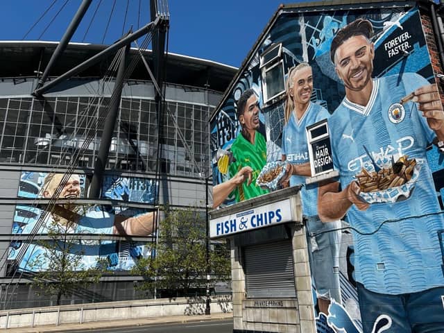The new Manchester City mural on the side of Maine Road Chippy.