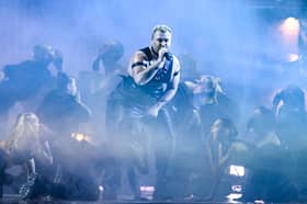 Sam smith performing at the Brit Awards 2023