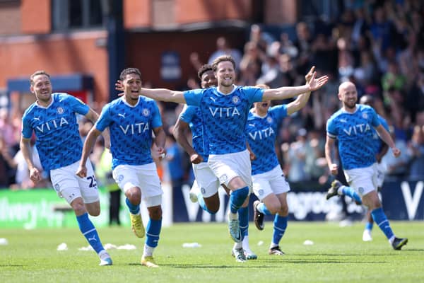 Stockport County players celebrate win over Salford City.  