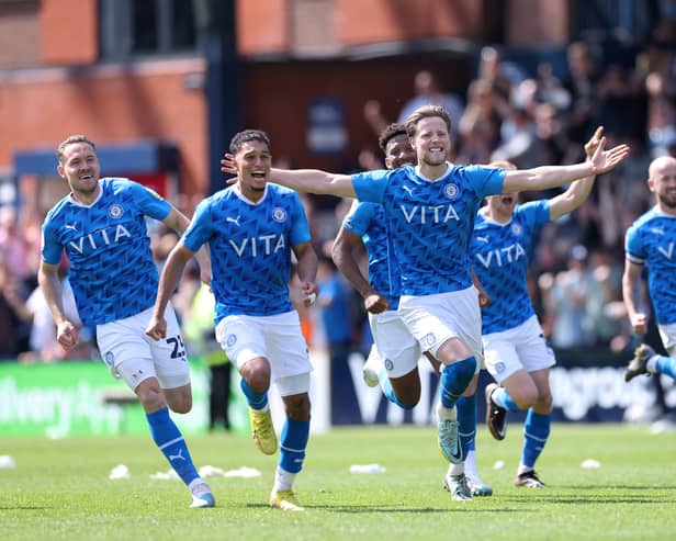 Stockport County players celebrate win over Salford City.  