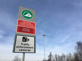 A Clean Air Zone sign in Hollinwood, Oldham. Pictured in February 2023. Credit: LDRS