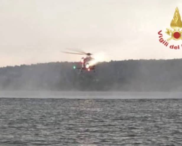 Italy's fire service posted an image of a helicopter taking part in the rescue (Image: Vigili del Fuoco)