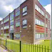 The front of the flat shows some of the communal garden space 