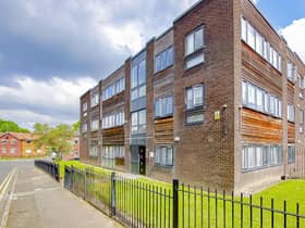 The front of the flat shows some of the communal garden space 