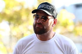 Tyson Fury speaks to the media at Brisbane Domestic Airport on May 25, 2023 in Brisbane, Australia. (Photo by Chris Hyde/Getty Images)