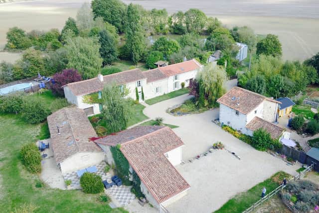 A family living "the rat race" sold their three-bedroom semi for £400,000 - and bought an entire French village.