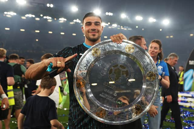 Tommy Fury of World XI celebrates with the Soccer Aid winners shield following Soccer Aid for Unicef 2023 at Old Trafford on June 11, 2023 in Manchester, England. (Photo by Matt McNulty/Getty Images)