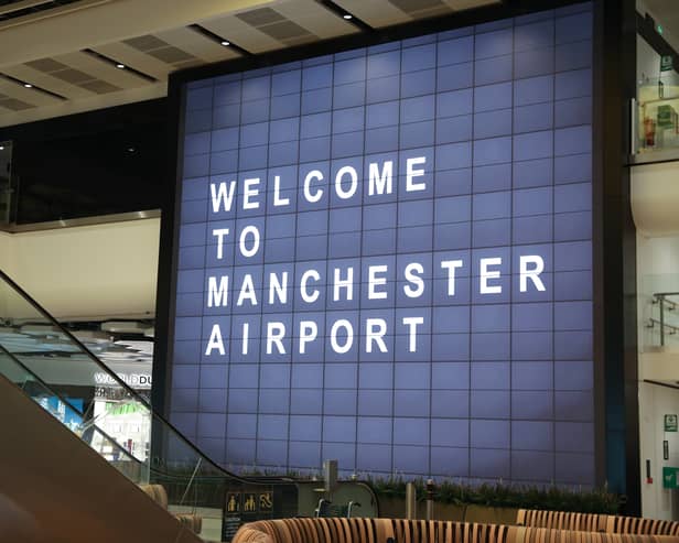 The sign welcoming passengers to Manchester Airport in  April 2021