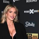 Helen Flanagan treats herself after attempting to capture a snap with her kids. (Photo credit: Getty)