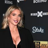 Helen Flanagan treats herself after attempting to capture a snap with her kids. (Photo credit: Getty)