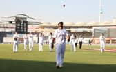 Rehan Ahmed of England walks off, after becoming the youngest debutant in men's Test history to take a five-for during day three of the Third Test between Pakistan and England at Karachi National Stadium on December 19, 2022 in Karachi, Pakistan. (Photo by Matthew Lewis/Getty Images)