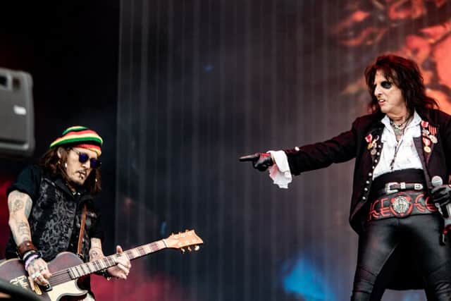 Johnny Depp and Alice Cooper performing as part of Hollywood Vampires
