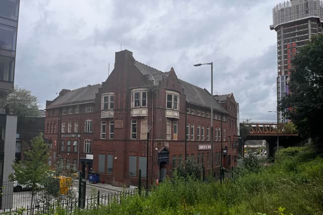 The Charter Street Ragged School and Working Girls Home outside Angel Meadows park.