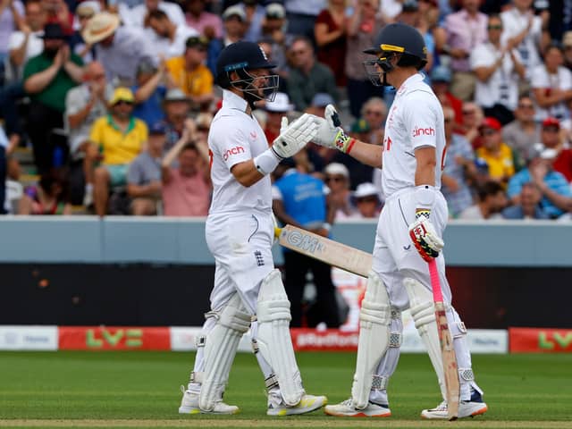 England's Ben Duckett (L) celebrates with England's Ollie Pope (R) after reaching his half century on day two of the second Ashes cricket Test match between England and Australia at Lord's cricket ground in London on June 29, 2023. (Photo by Ian Kington / AFP) / RESTRICTED TO EDITORIAL USE. NO ASSOCIATION WITH DIRECT COMPETITOR OF SPONSOR, PARTNER, OR SUPPLIER OF THE ECB (Photo by IAN KINGTON/AFP via Getty Images)