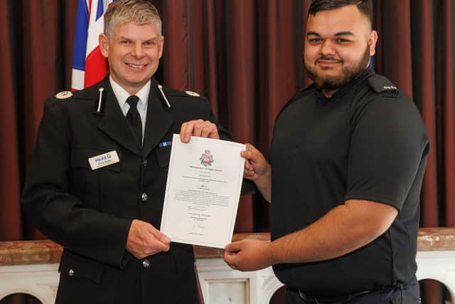 PC Sammal Zaman was sworn is as a police constable in training last week, after years of working with the force as an apprentice. Credit: GMP