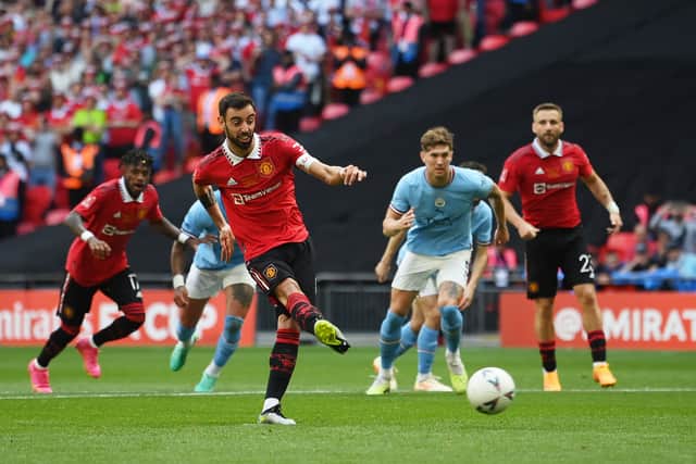 Bruno Fernandes of Manchester United scores the team's first goal from the penalty spot during the Emirates FA Cup Final between Manchester City and Manchester United at Wembley Stadium on June 03, 2023 in London, England. (Photo by Mike Hewitt/Getty Images)
