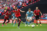 Bruno Fernandes of Manchester United scores the team's first goal from the penalty spot during the Emirates FA Cup Final between Manchester City and Manchester United at Wembley Stadium on June 03, 2023 in London, England. (Photo by Mike Hewitt/Getty Images)