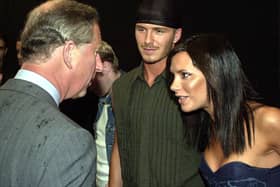 The Prince of Wales (L) meets pop star Victoria Beckham (R) and her husband David (C) at the Princes Trust Capital FM Party in the Park 2000, London late 09 July 2000. Victoria made her solo debut at the huge outdoor charity show 09 July in front of 100,000 music fans. She is the last of the Spice Girls to branch out with her own pop career as she joined dance act Truesteppers.
