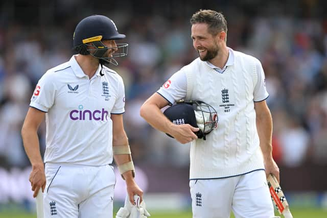 LEEDS, ENGLAND - JULY 09: Chris Woakes of England celebrates with teammate Mark Wood after hitting the winning runs to win the LV= Insurance Ashes 3rd Test Match between England and Australia at Headingley on July 09, 2023 in Leeds, England. (Photo by Stu Forster/Getty Images)