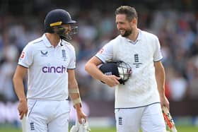 LEEDS, ENGLAND - JULY 09: Chris Woakes of England celebrates with teammate Mark Wood after hitting the winning runs to win the LV= Insurance Ashes 3rd Test Match between England and Australia at Headingley on July 09, 2023 in Leeds, England. (Photo by Stu Forster/Getty Images)