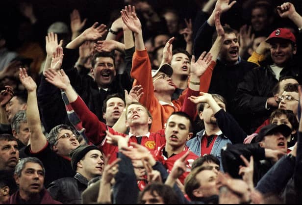 United fans celebrate at Inter Milan's San Siro in 1999. A 1-1 draw would see the Red Devils thorough to the semi-finals of the Champions League. 